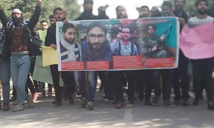 Kashmir University students march in solidarity with AMU students
