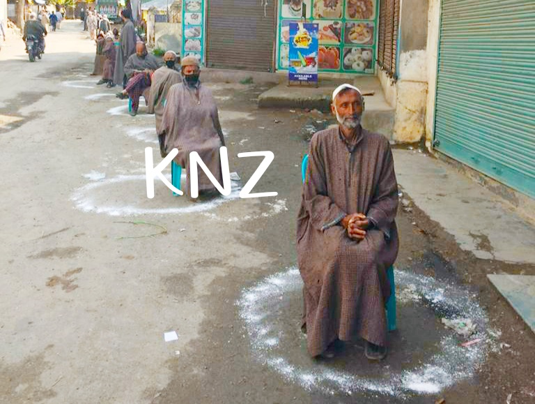 Social distancing norms followed at JK Bank branch in Lar Ganderbal