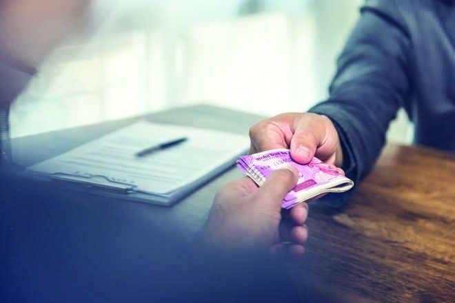 ACB arrests revenue official on bribe charges