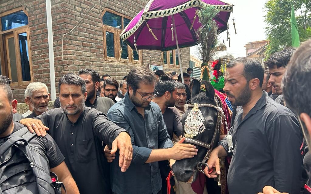 PDP leader Zuhaib Mir visits Balhama,Participates in Zuljanah procession