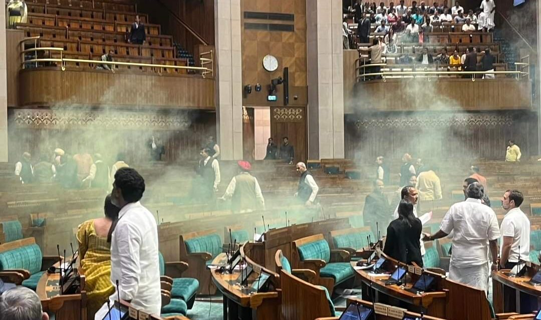 2 detained for protesting outside Parliament carrying cans that emitted yellowish smoke