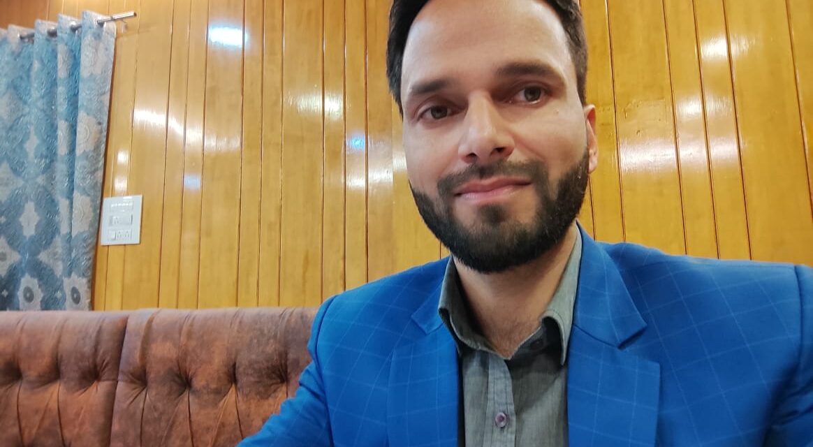 DMO Pulwama Er Mohammad Manzoor greets people on the eve of Eid-ul-Adha