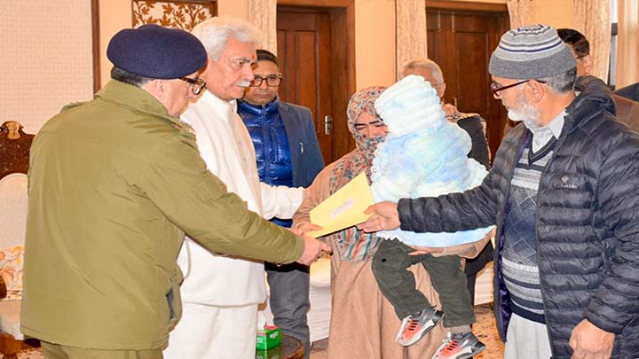 LG Sinha meets the families of Nowgam’s accidental blast martyrs, hands over appointment letters on compassionate grounds