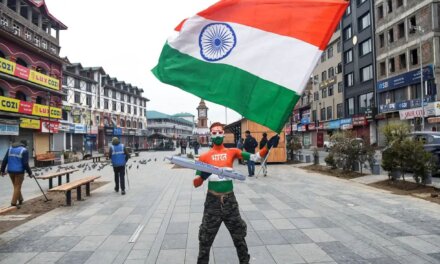 Tourist paints himself in Tricolour as he marks 77th Republic Day at Srinagar’s Lal Chowk